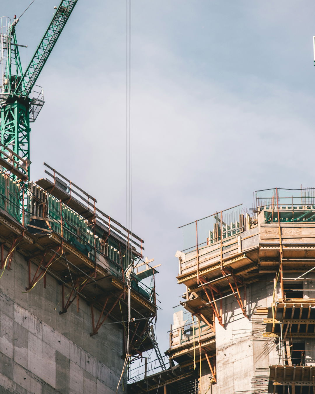low-angle-photography-of-concrete-building-during-daytime.jpg low angle photography of concrete building during daytime
